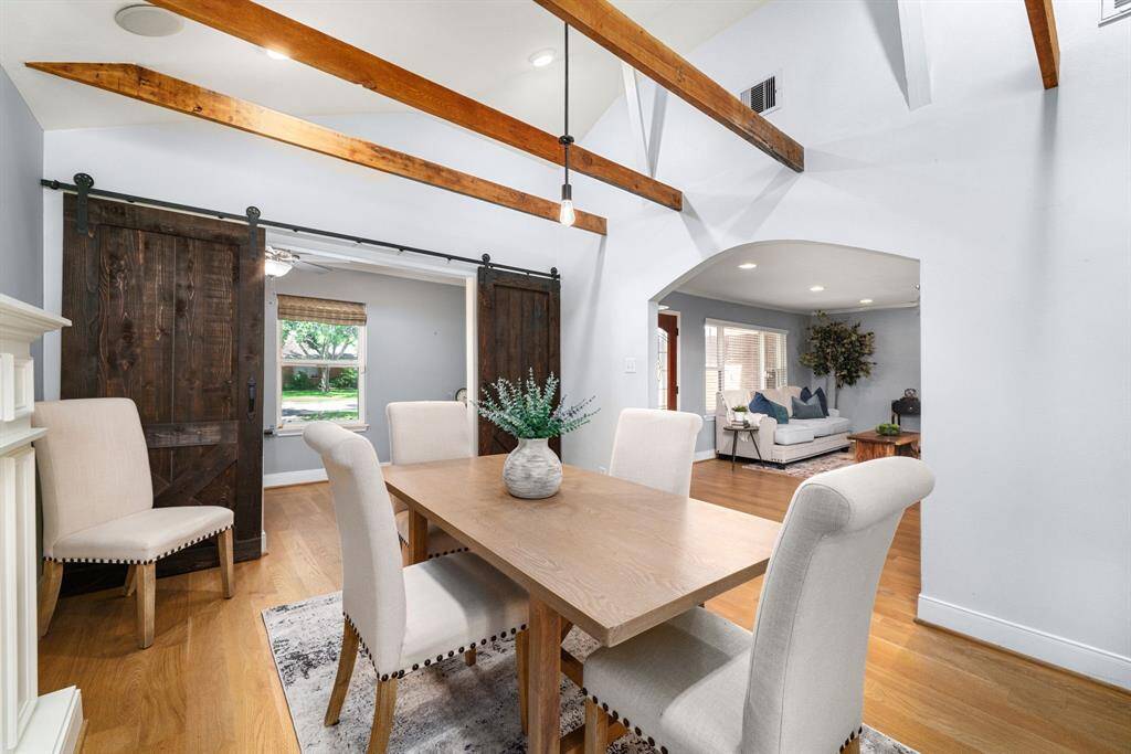 Farmhouse charm meets modern living—enjoy stylish barn doors, vaulted ceilings & warm details throughout. A must-see in person!
