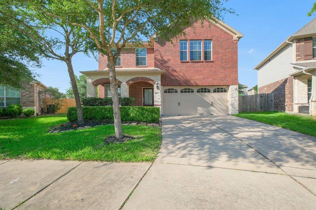 Welcome home! This beautifully maintained two-story offers great curb appeal with a double driveway and spacious two-car garage.