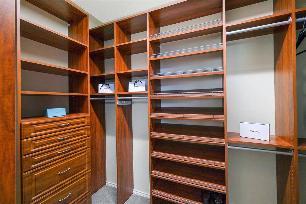 The custom built-in storage in this closet is gorgeous and ready to organize your life!