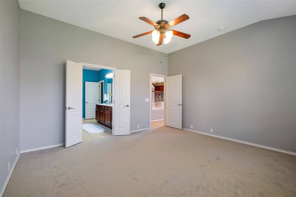 Another view of the primary bedroom.