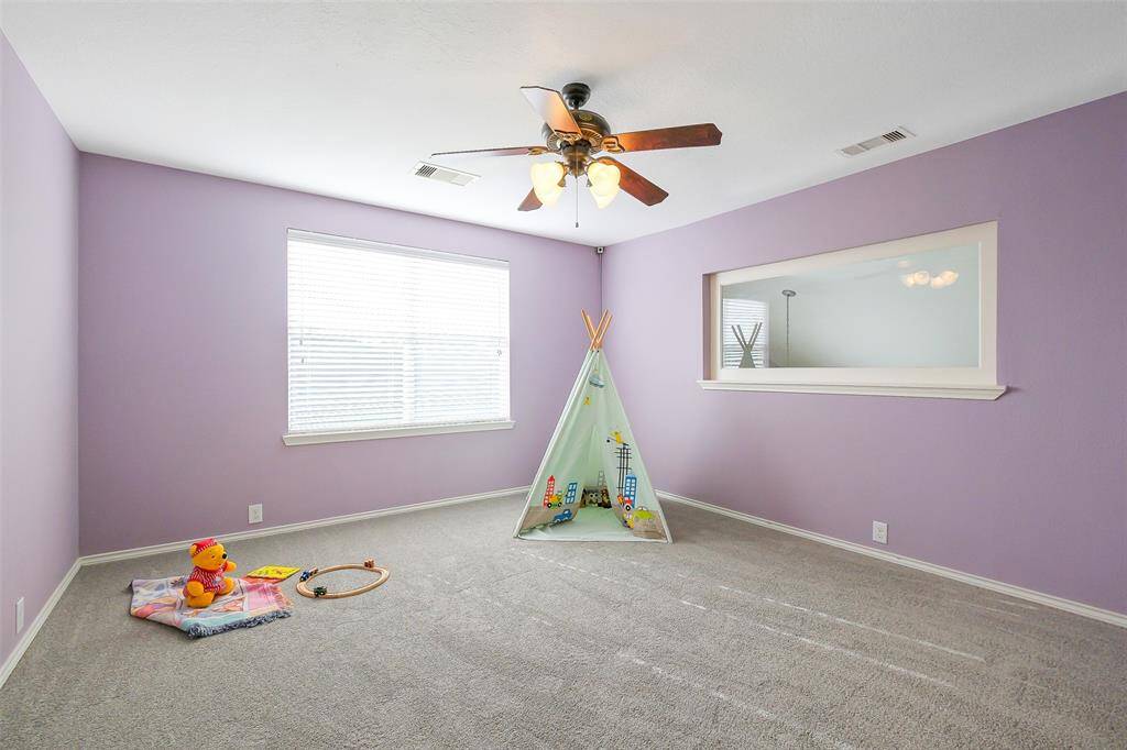 The upstairs game room/office is roomy and bright!