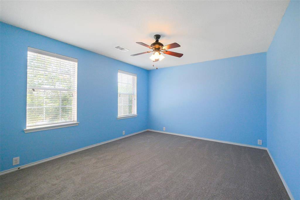 Guest bedroom number 3 is also upstairs.