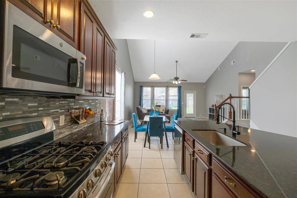 There is so much counter space and storage space in this kitchen.