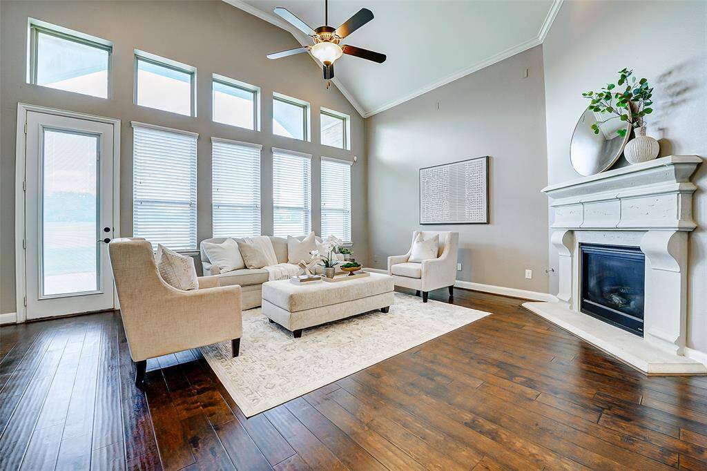 The living area is definitely a feature of the home! Bright and spacious with a modern fireplace, creating a welcoming atmosphere.