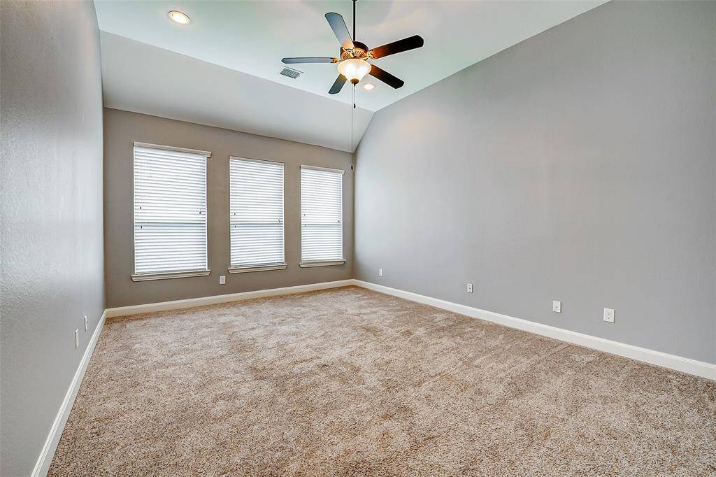 A game room you MUST SEE in person! It's HUGE and ready for gaming, movie watching or anything else you need.