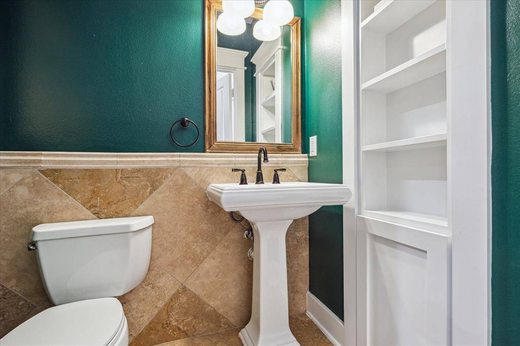 Bathroom located on the first floor; secret access to a new storage closet under the stairs.