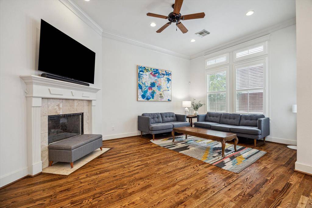 Large light and bright den with views to the backyard and covered porch.