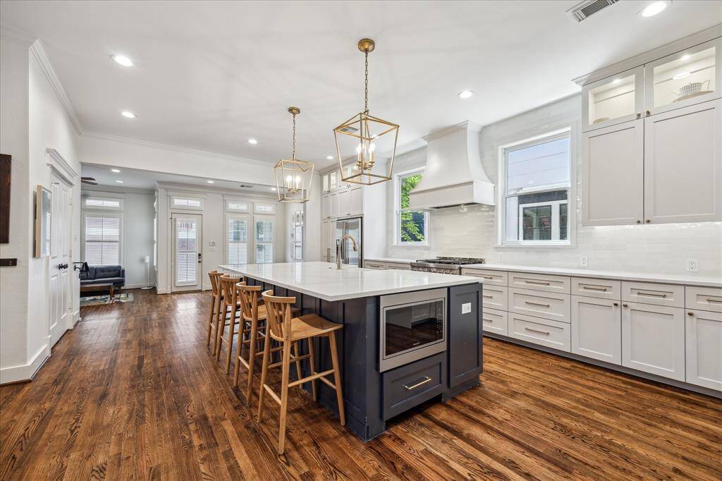 Two pendant lights hang over the island, adding a nice touch of character and extra lighting.