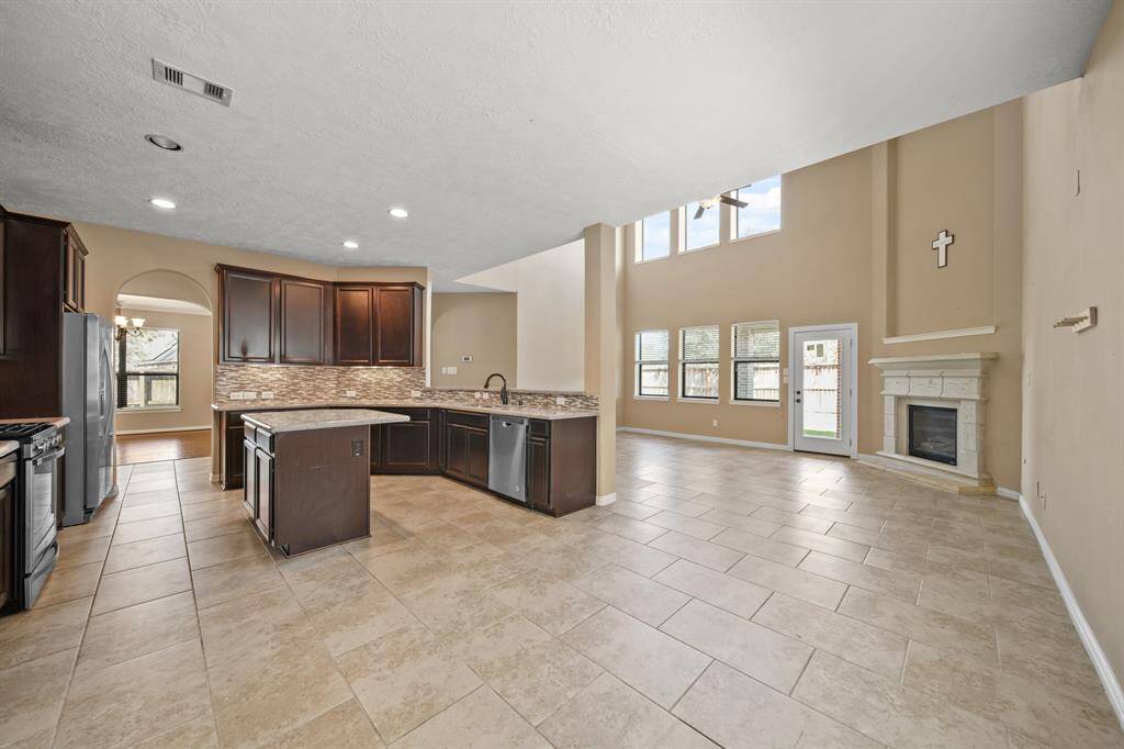 View from Breakfast Room showcasing the open floorplan and access to areas on the first level for ease and entertainment