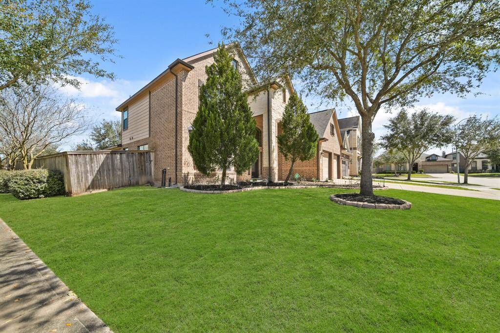 Alternate view of the home upon arrival with an inviting walkway and fantastic front elevation