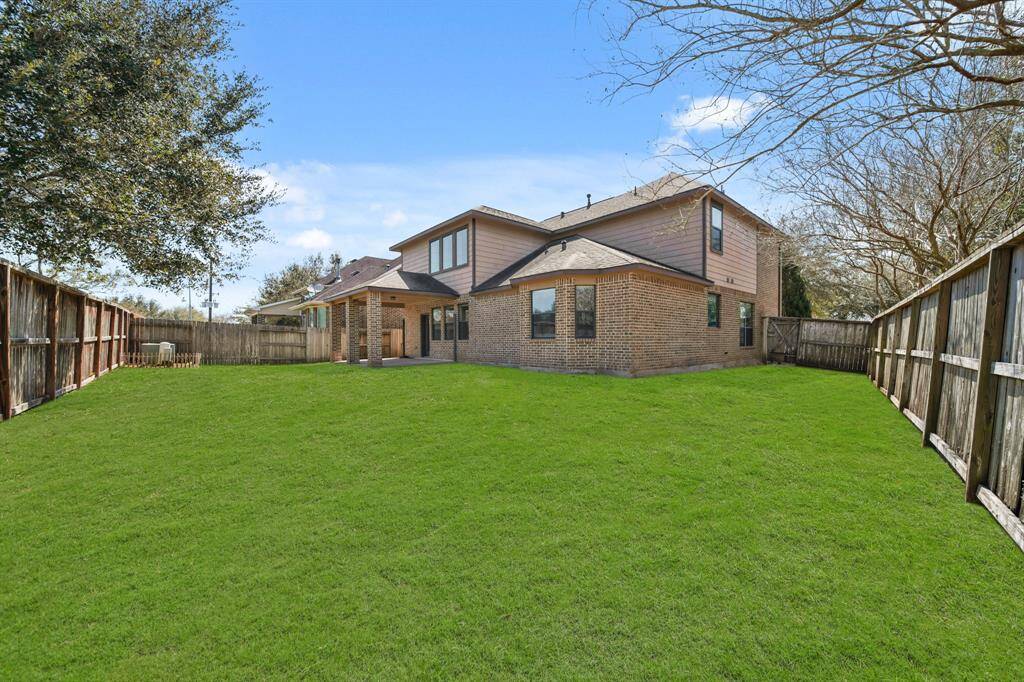 Beautiful Backyard with an abundance of greenspace offered to add a pool, playscape or pergola