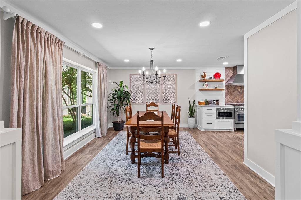Formal dining area opens to kitchen and entry. Perfect for entertaining!