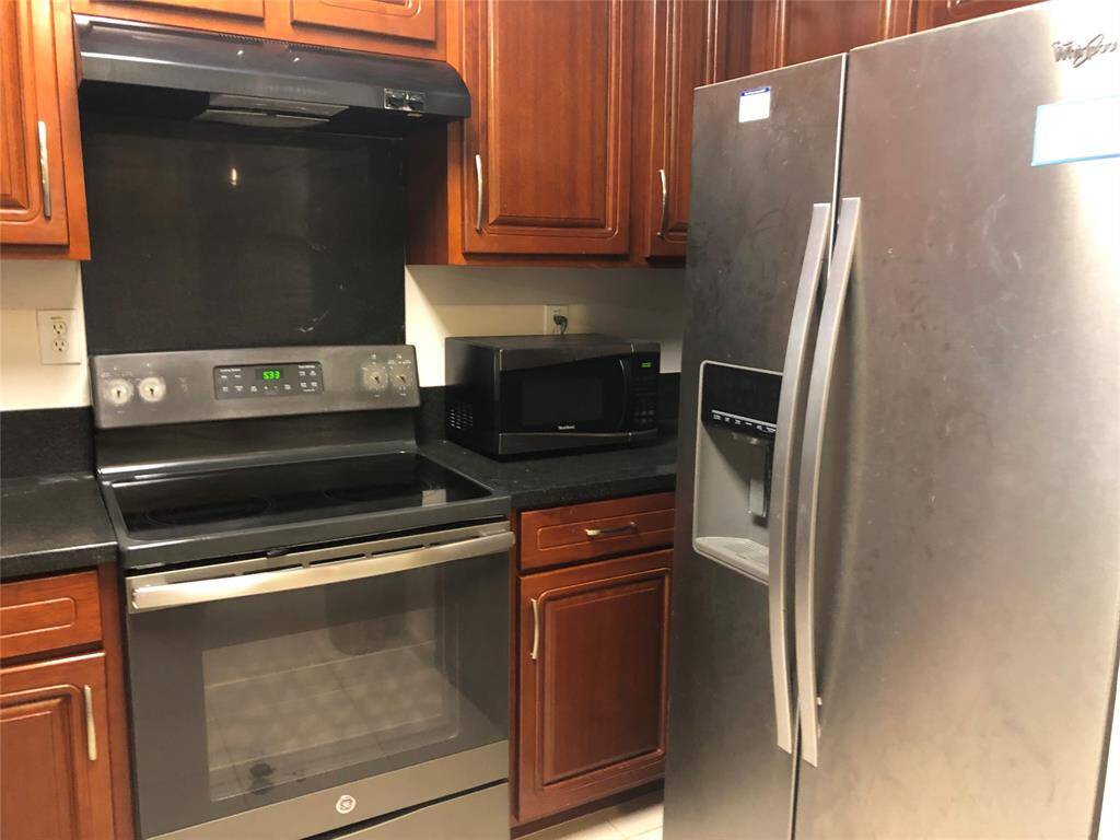 Counter top microwave and oven are included.
