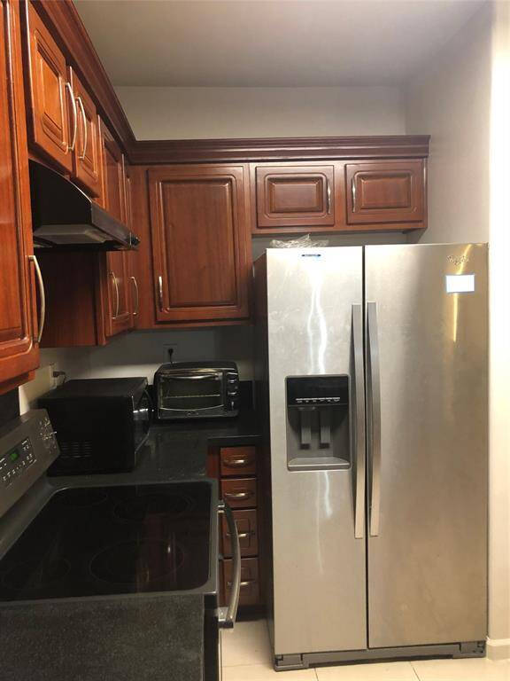 Counter top microwave and oven are included.