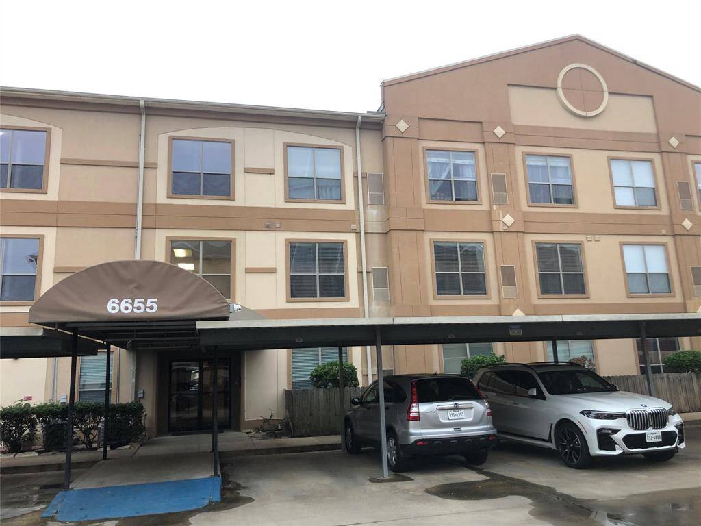 Exterior view of the 6655 building and covered carports