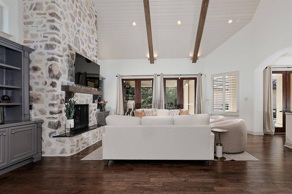 Cathedral, wood beam accented ceiling