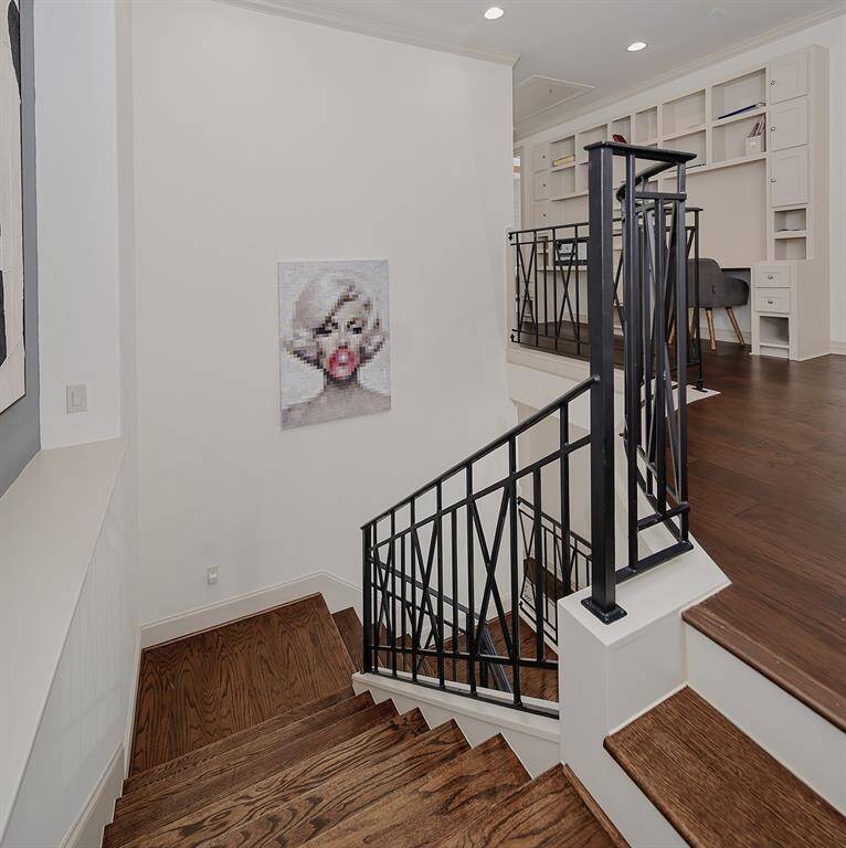 Wood staircase and iron railing