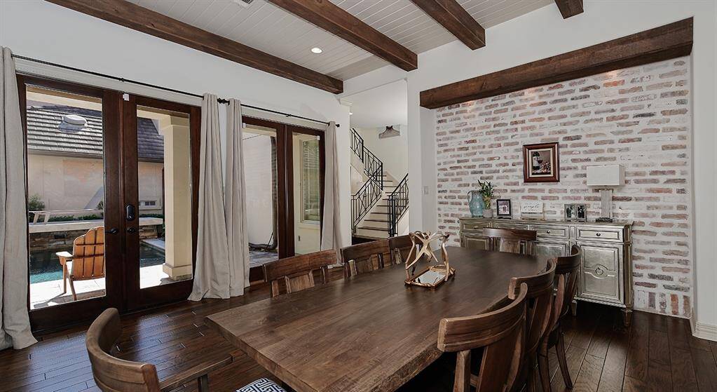 Dining or living area overlooking the scenic pool