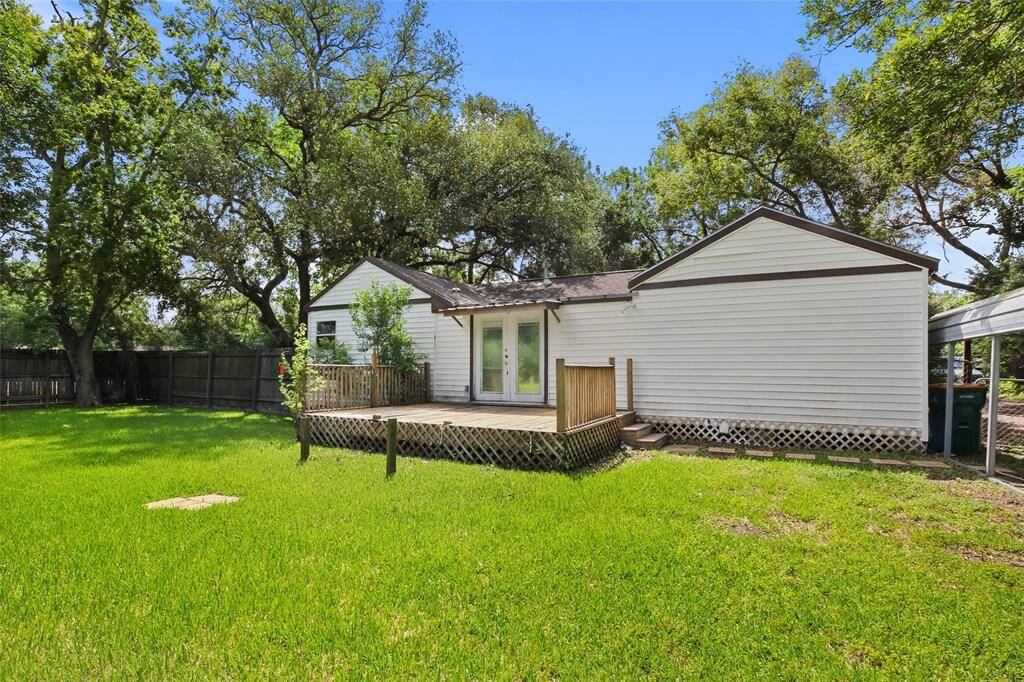 Another rear view of home/deck