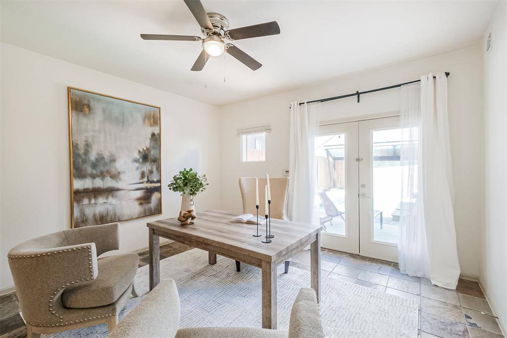 The 1st floor has this attractive room with an en suite. Can be used as Bed 3 or an office / play room. Double doors lead to the yard and pool.