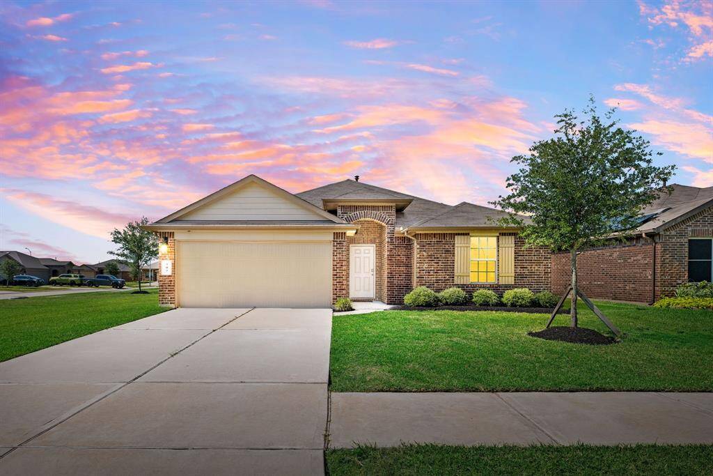 Welcome home to 707 Desert Pea Lane located on a quiet street in the Southern Colony community and zoned to Fort Bend ISD! This stunning home has lovely curb appeal, a well-manicured lawn, beautiful landscaping, brick elevation, covered front porch, traditional style, custom color shutters, beautiful outdoor lanterns and a double wide driveway!