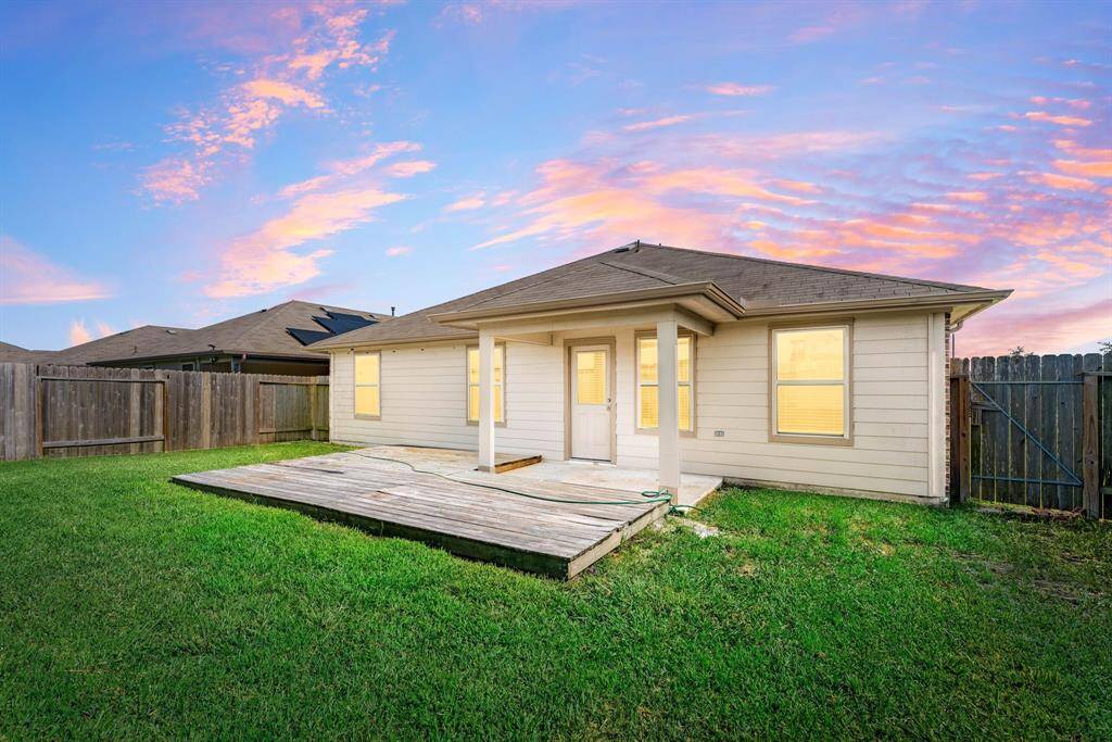 Sit back, relax and enjoy your gorgeous backyard under your covered patio. Plenty of space for an outdoor  grilling station and outdoor seating. Your covered patio overlooks your huge backyard with plenty of green space for the kids and your furry friends to enjoy.