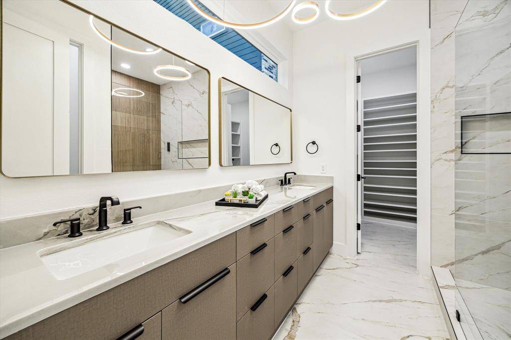 Primary bathroom with 9ft vanity.