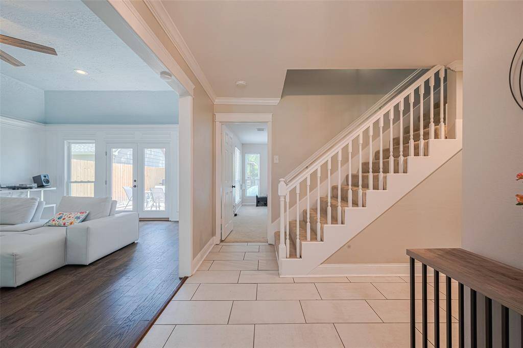 Upon entering the property, you'll be greeted by a foyer that seamlessly transitions into the elegant formal living area.