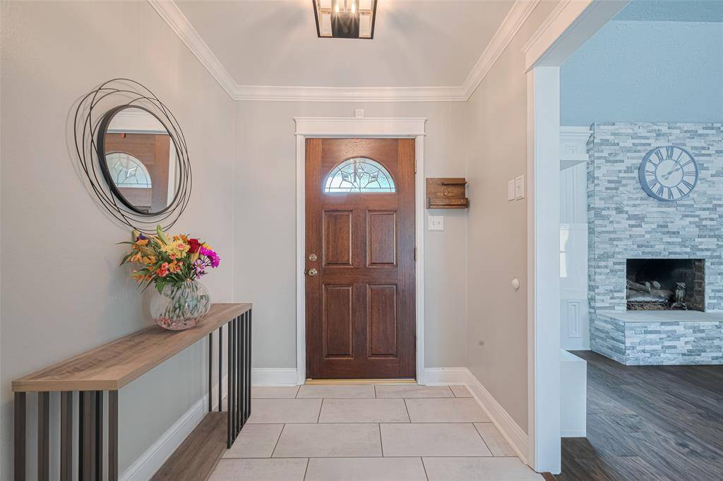 A different perspective of the property's entrance, showcasing its inviting charm.