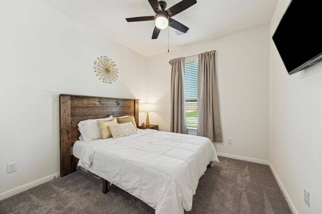 The second of the two secondary bedrooms also has a double-wide closet.