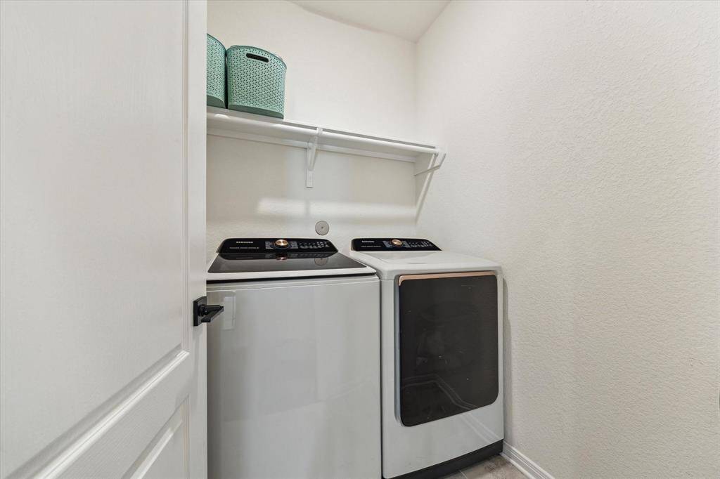 The walk-in utility room is centrally located in the house while remaining discreet.