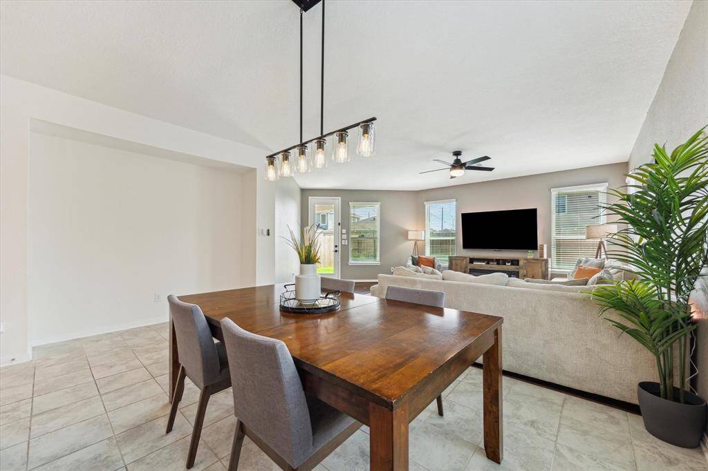 Off the formal dining space is a large inset wall, great for a buffet or hutch.