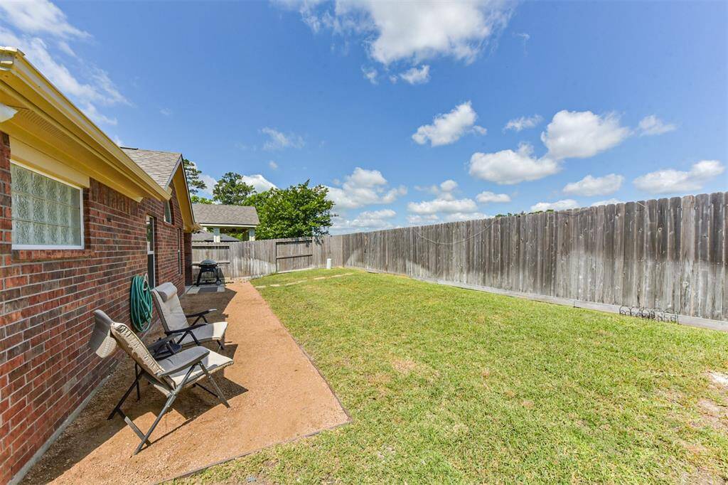 Backyard has gate leading to Benignus Elementary.