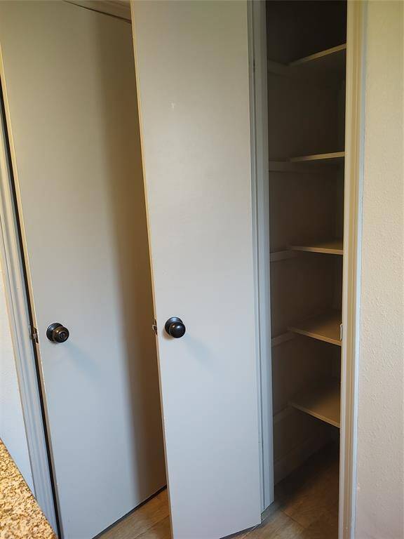 this is the linen closet in bathroom for storage.
