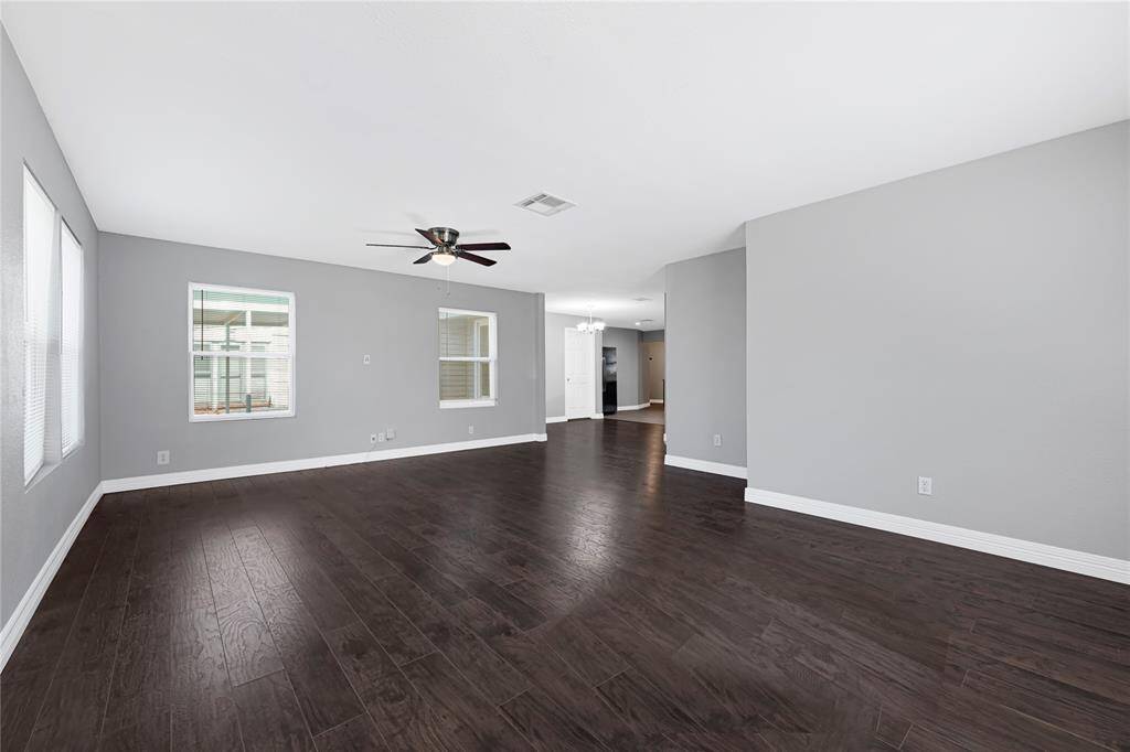 Living area open to Dining and Kitchen