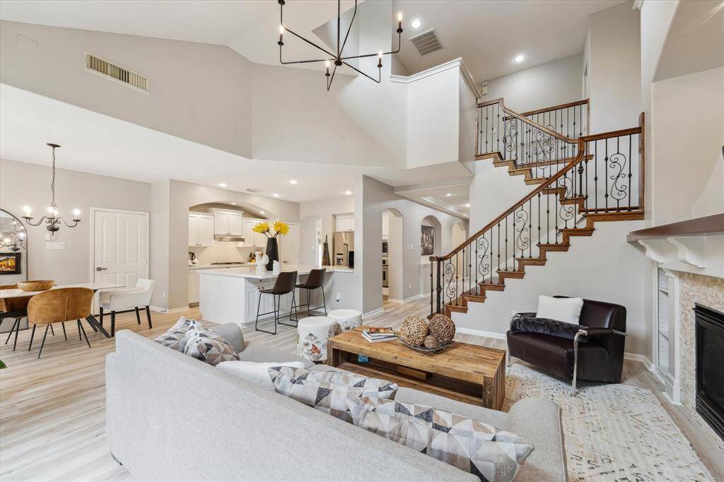 Look at this amazing open floor plan, with its high ceiling, interconnected with a seamless flow with the upgraded kitchen