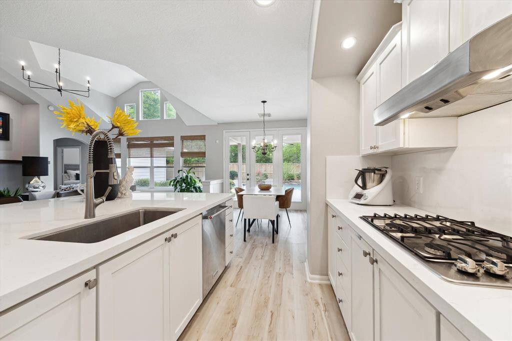 another view of the kitchen and the breakfast area.
