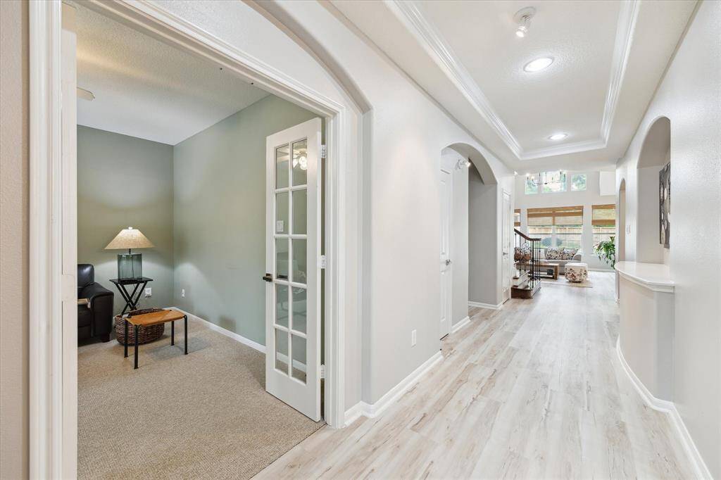 Off the Foyer you have the office to your left a great room that give you views of the front yard. It's set up as a tv room, it can be a flex room for all kind of uses