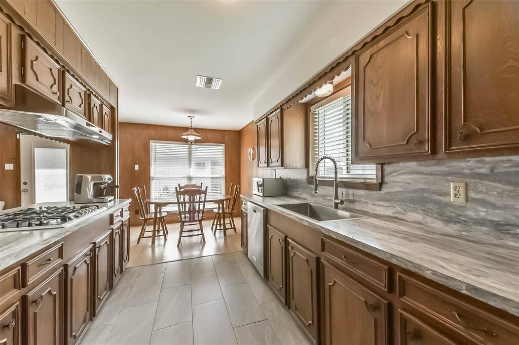 View to the breakfast room, show casing the the sleek porcelain tiles on the floor.