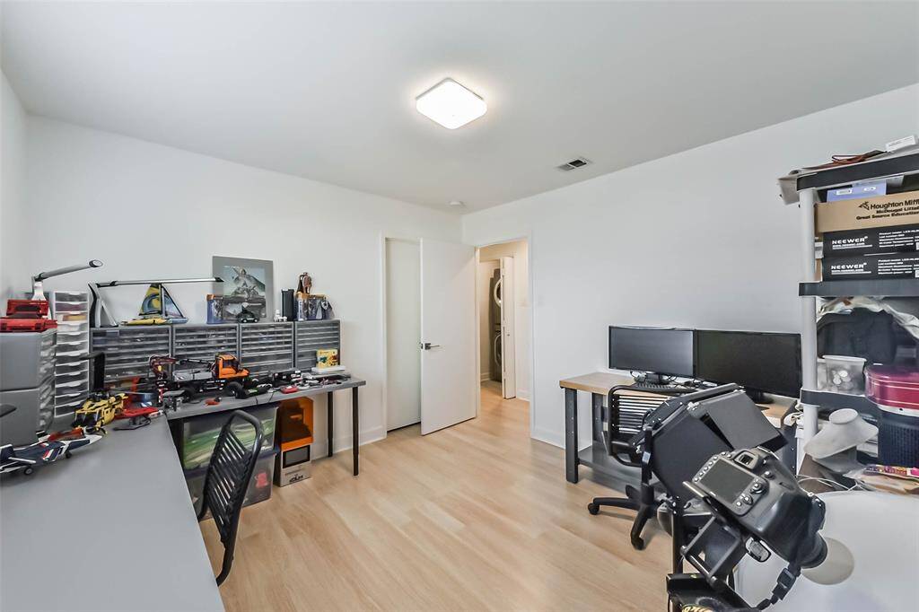 The fourth bedroom is currently used as a work station. With direct access to a walk-in-closet it can easily be reconverted to its original purpose.