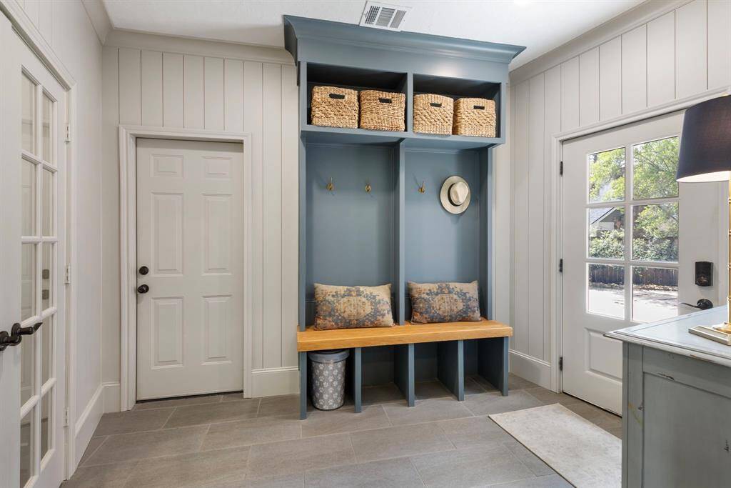 Bench with entry to three car garage