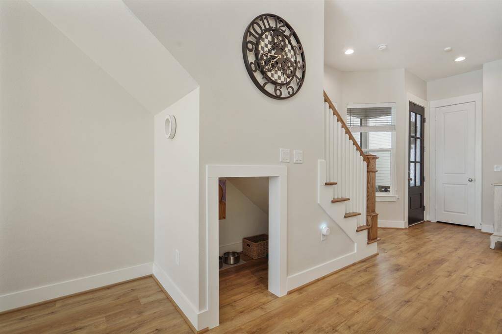View of the built-in Dog House under the stairs and spot for office space