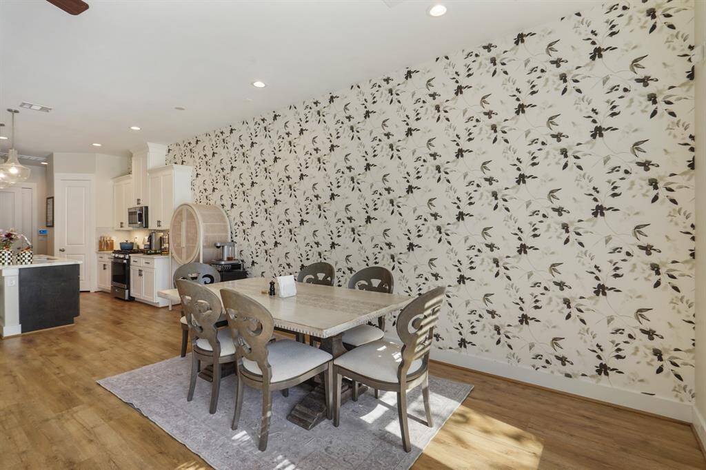 Large dining room with custom wallpaper