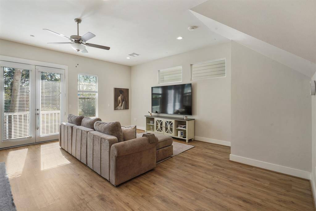 Livingroom with lots of natural light and spot for an office
