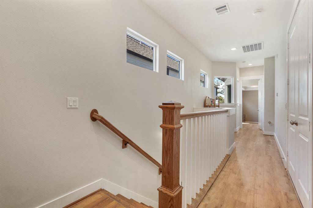 View from the top of the stairs with view into the Owner's Suite