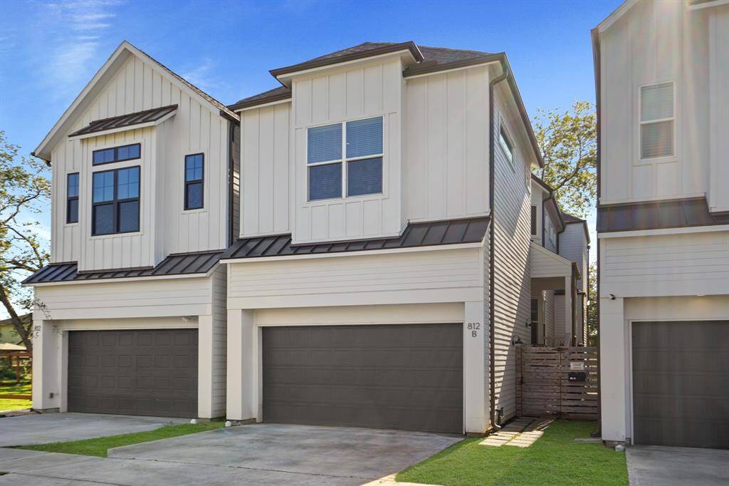 Detached home with view of entry and privacy fence