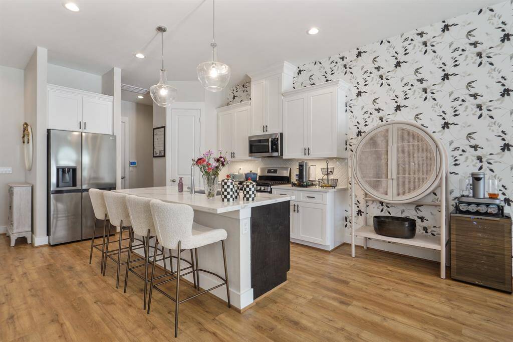 Lots of counterspace with view of mudroom and garage