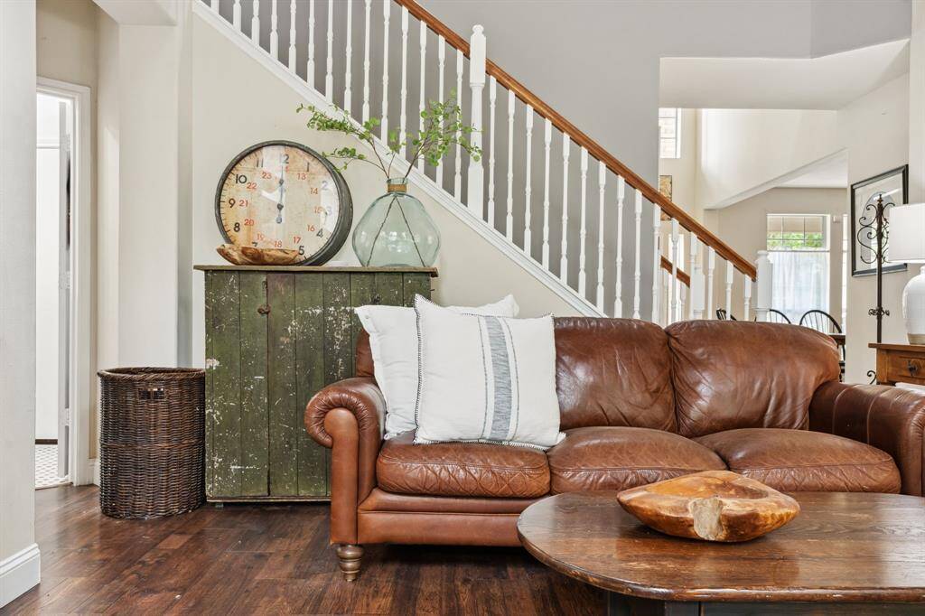 The living room also has access to the staircase to the second floor.