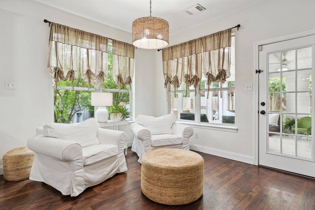 This thoughtfully designed homeseamlessly connects the kitchen witha charming sitting area.