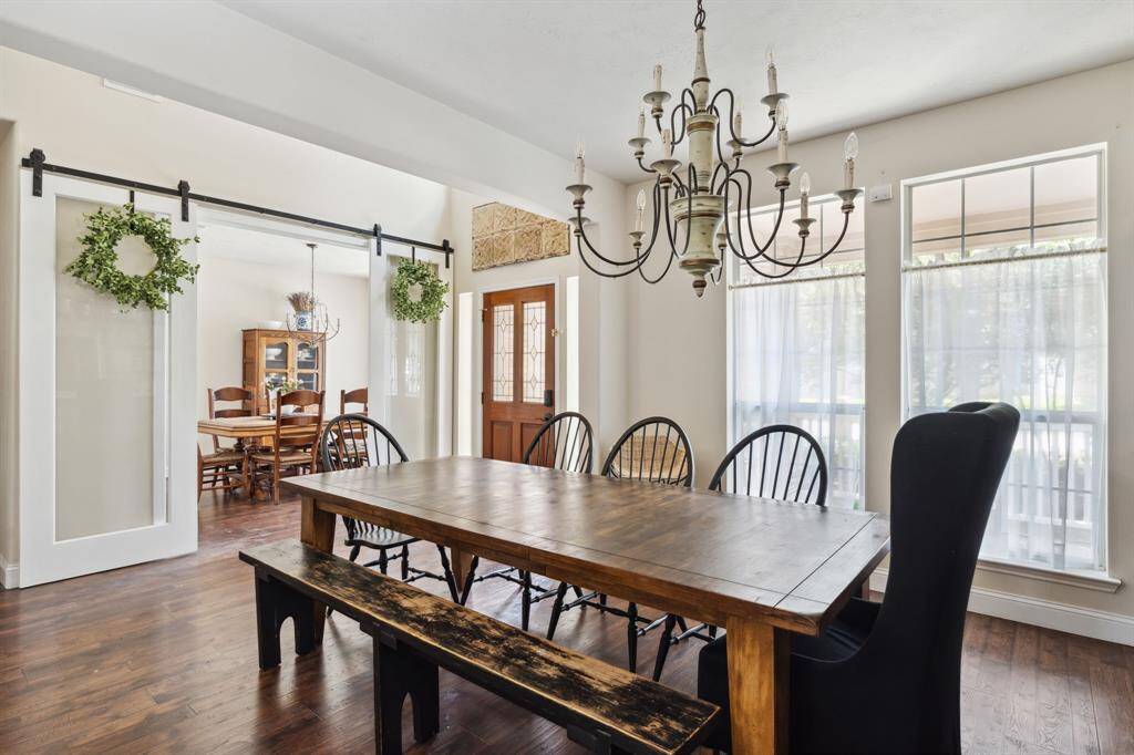 The room is enhanced by acaptivating chandelier.